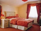 roman flat bedroom